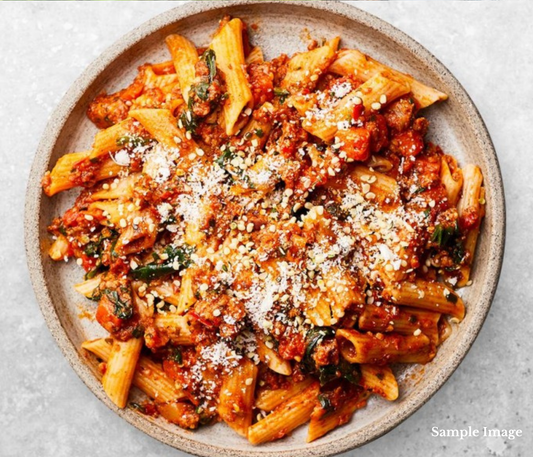 Slow Cooked Beef Ragu with Penne Pasta & Fresh Basil